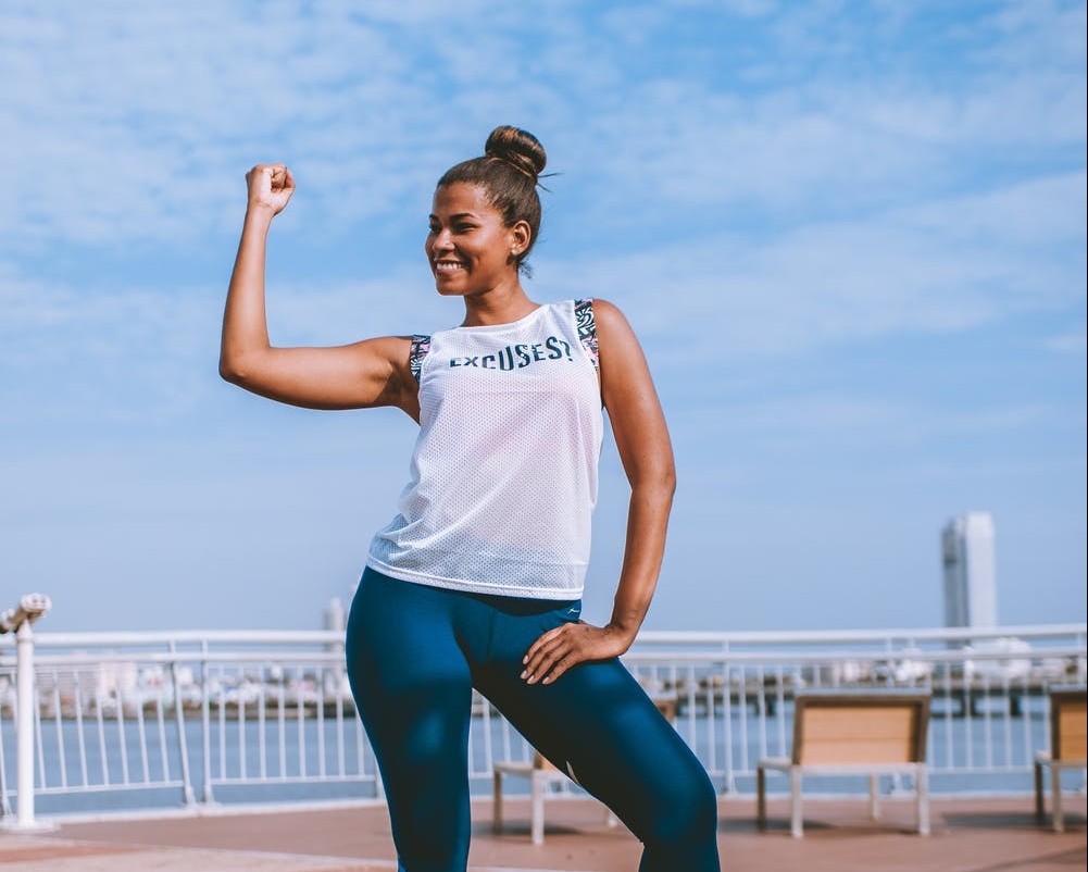 Woman posing in exercise gear