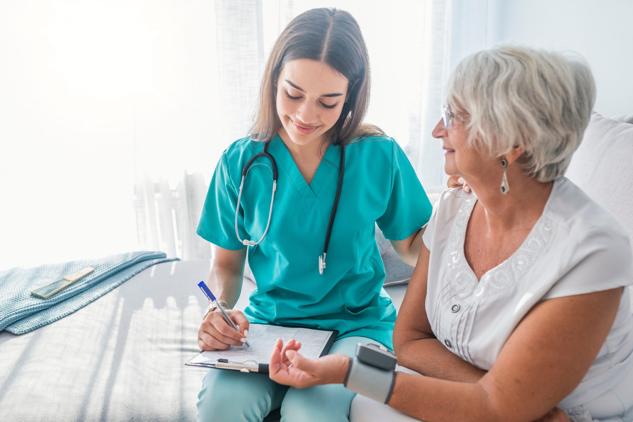 Female healthcare worker with a patient