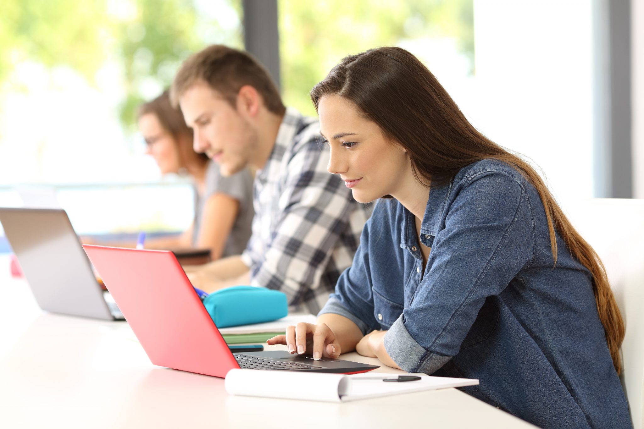 Students studying on laptops