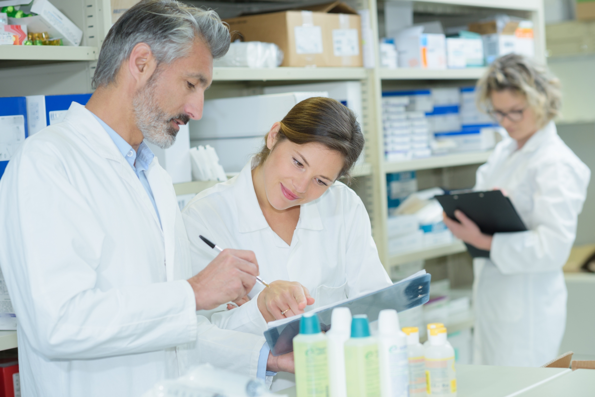Healthcare professionals taking inventory