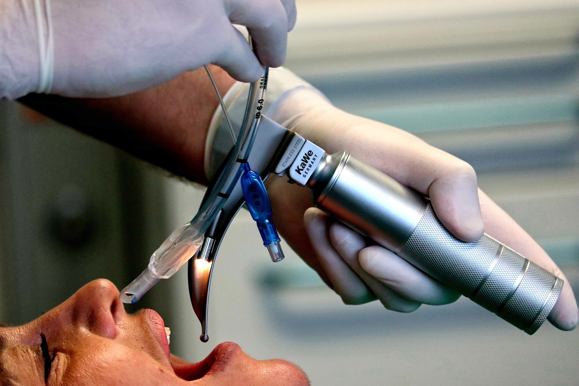 Healthcare professional using a laryngoscope