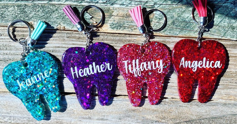 Personalized keychain with a tooth shape