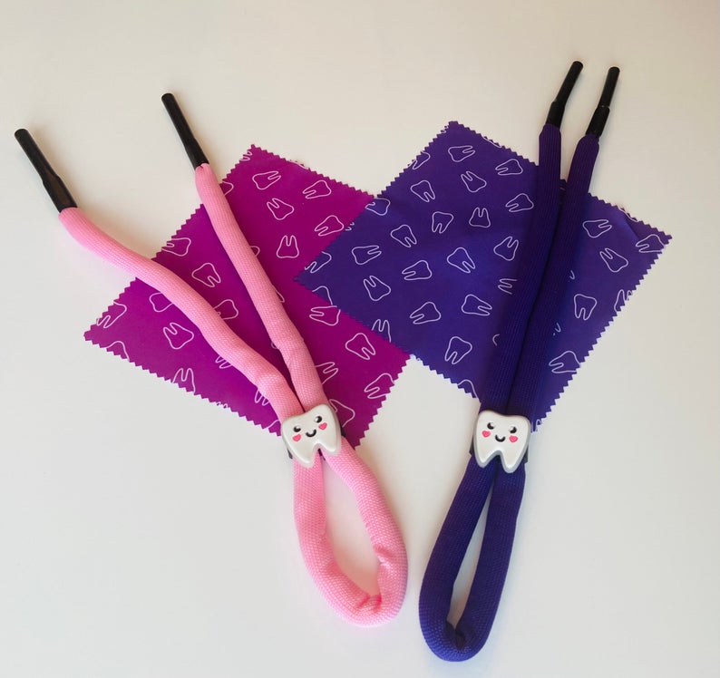 Glasses strap with a tooth clip