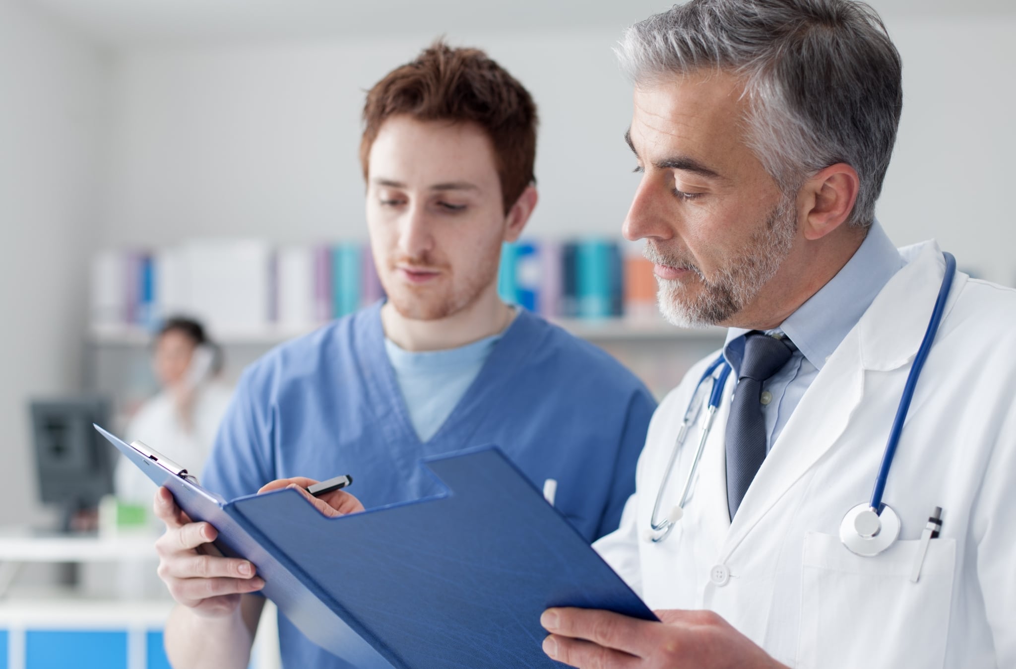 Medical team examining a chart