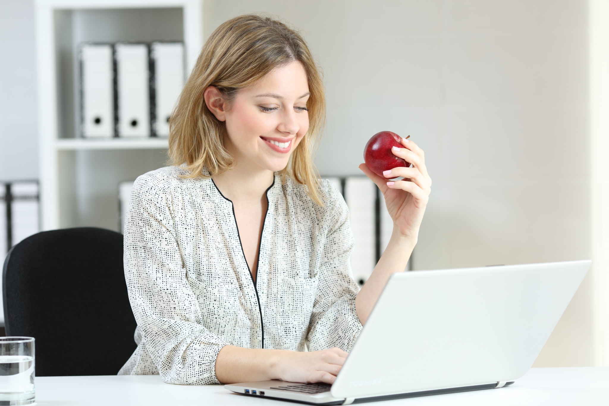 Healthy businesswoman working on a laptop