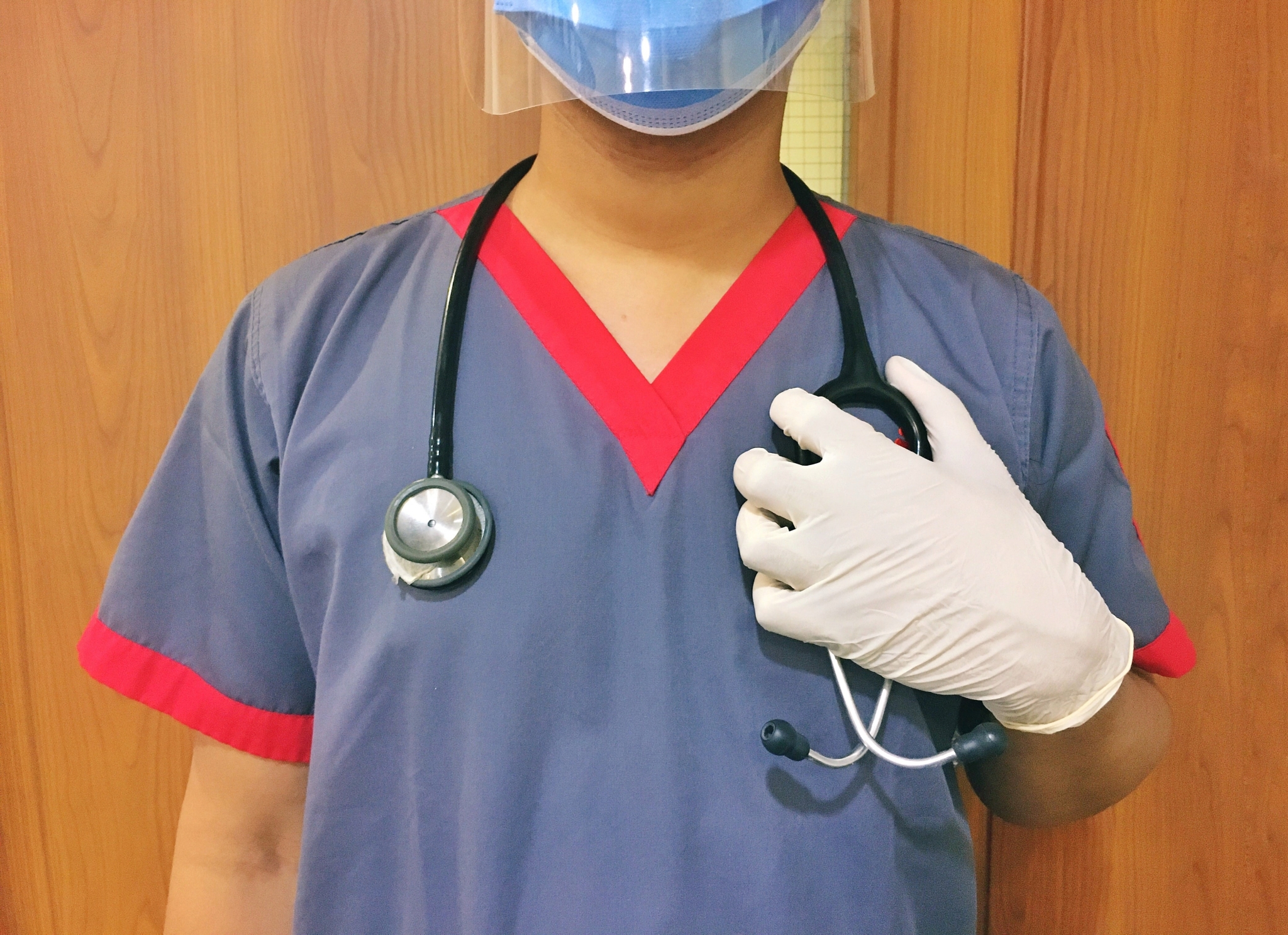 Close up of medical worker with stethoscope