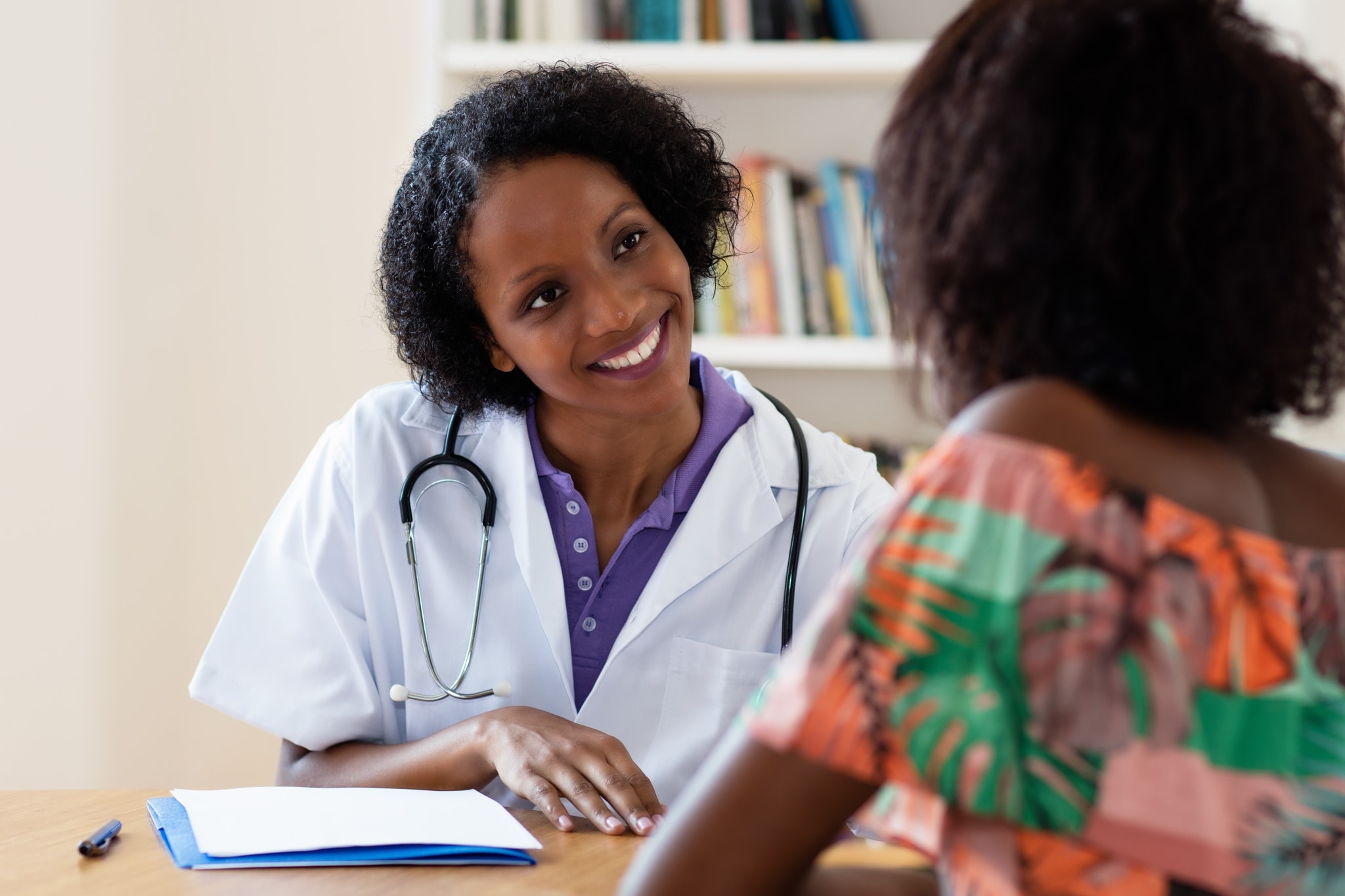African-American professional with a patient