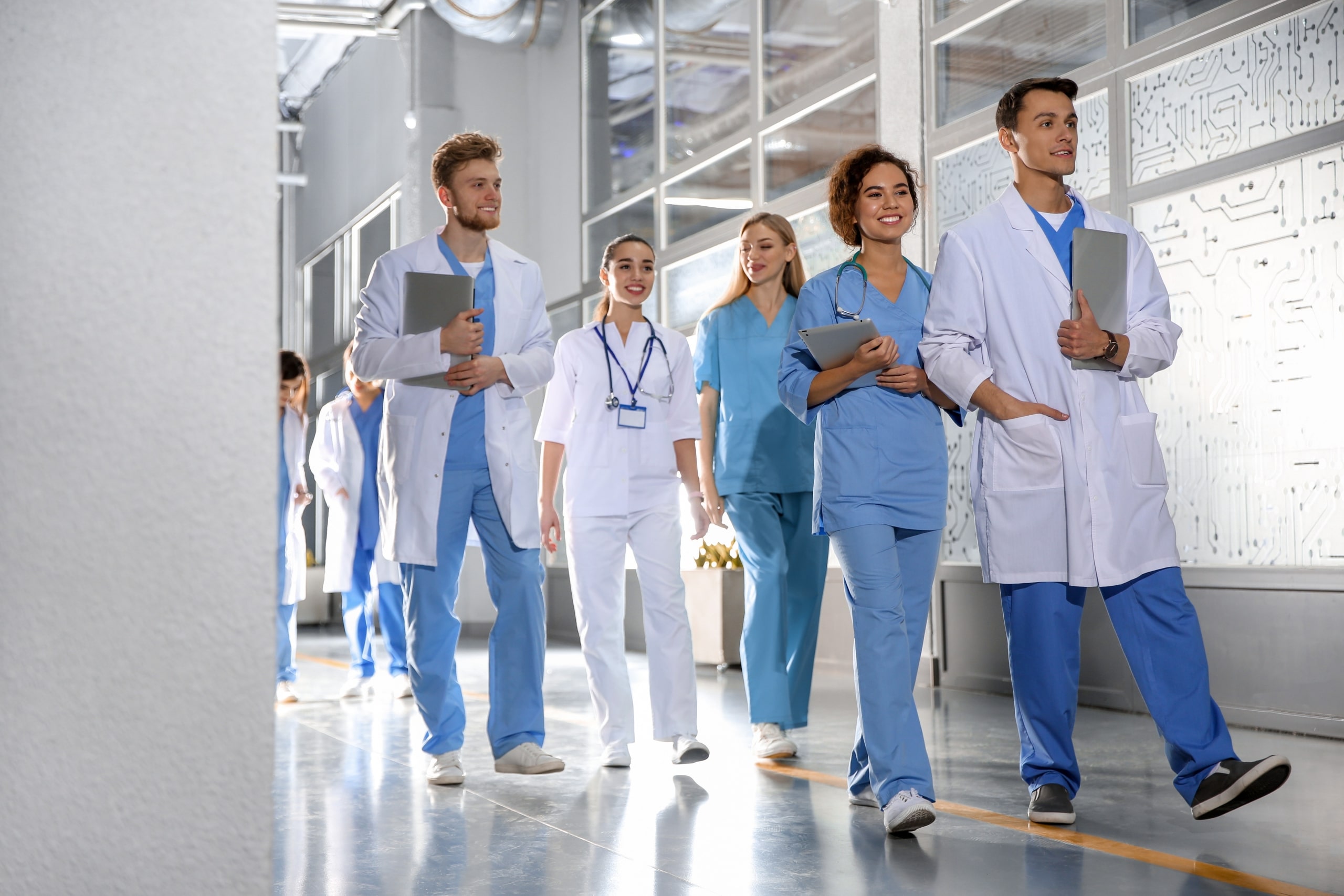 Medical students walking in a hallway
