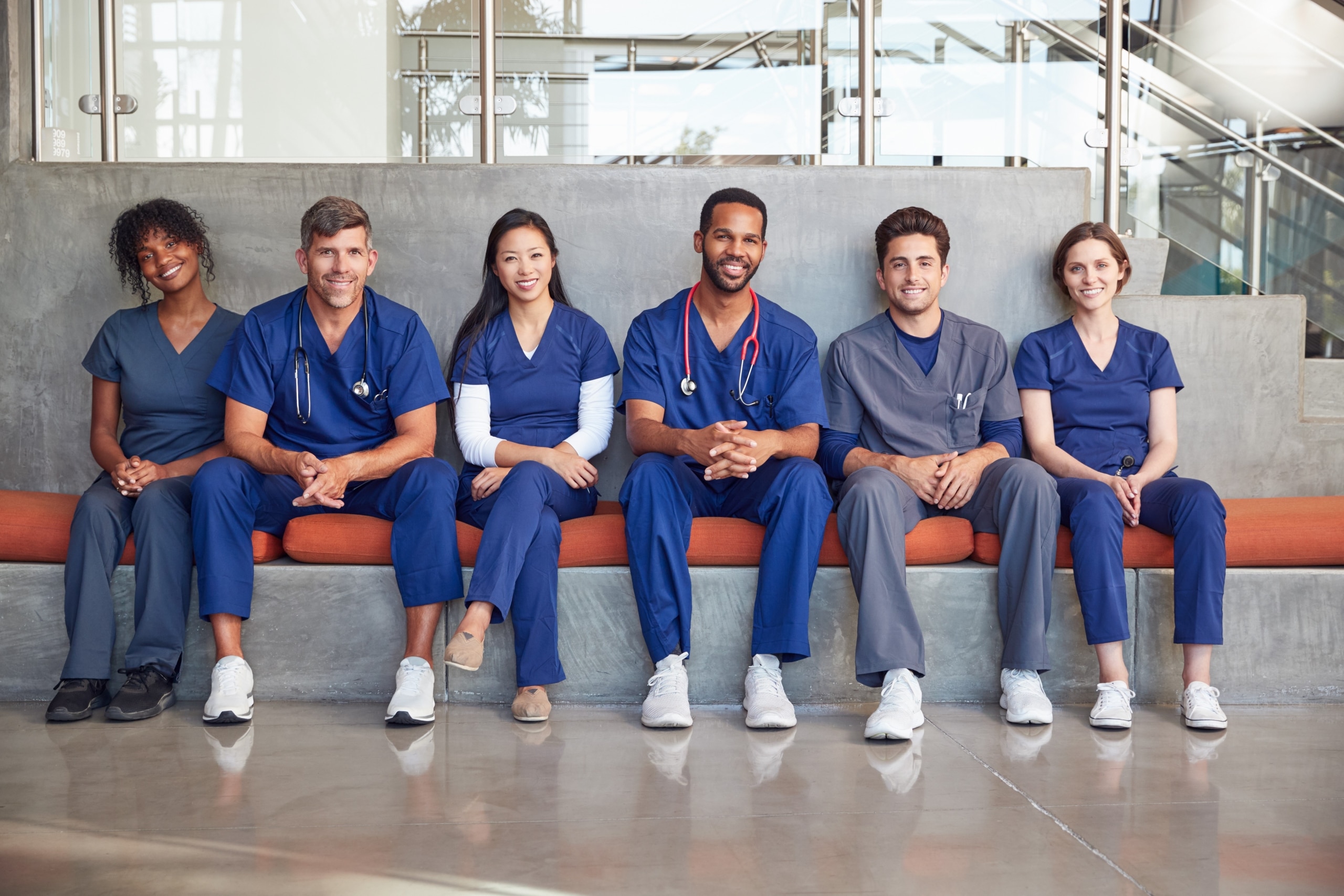 Group of medical students sitting on a bench