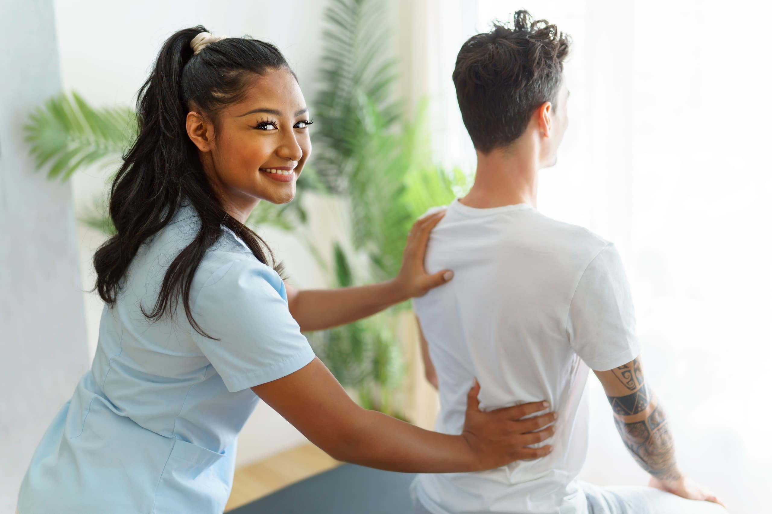 Diverse physiotherapy professional working at a clinic