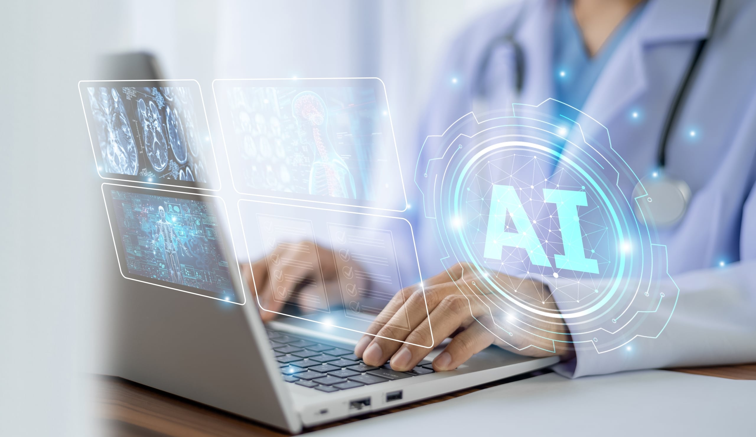 Nurse using AI technology while typing on a laptop